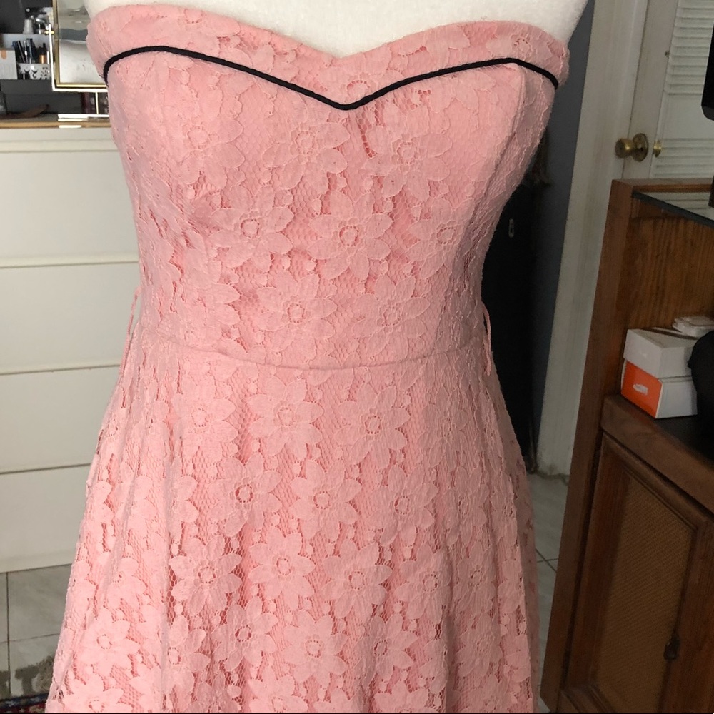 Pink lace dress with sweetheart front.